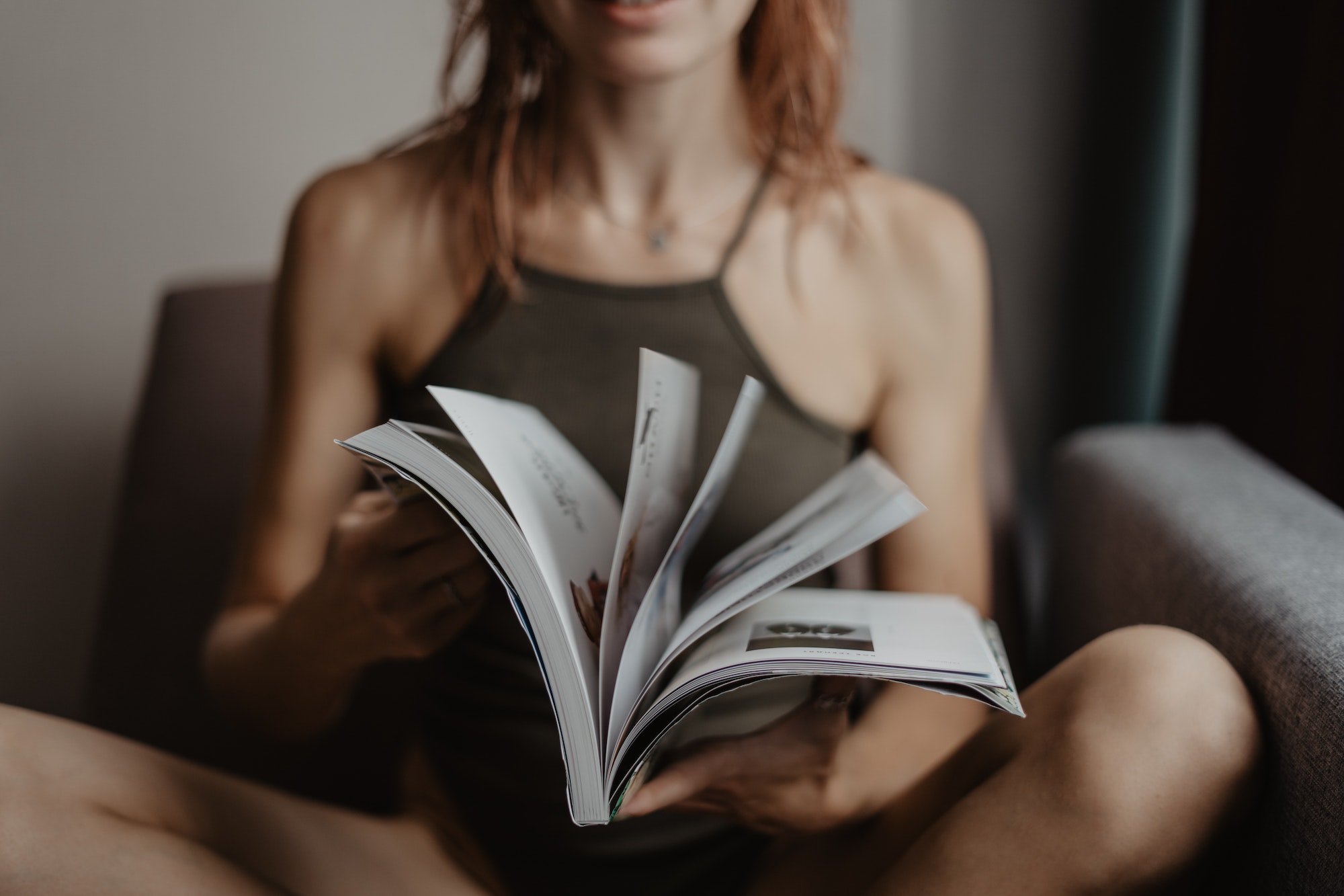 Girl with a magazine in her hands / sexy